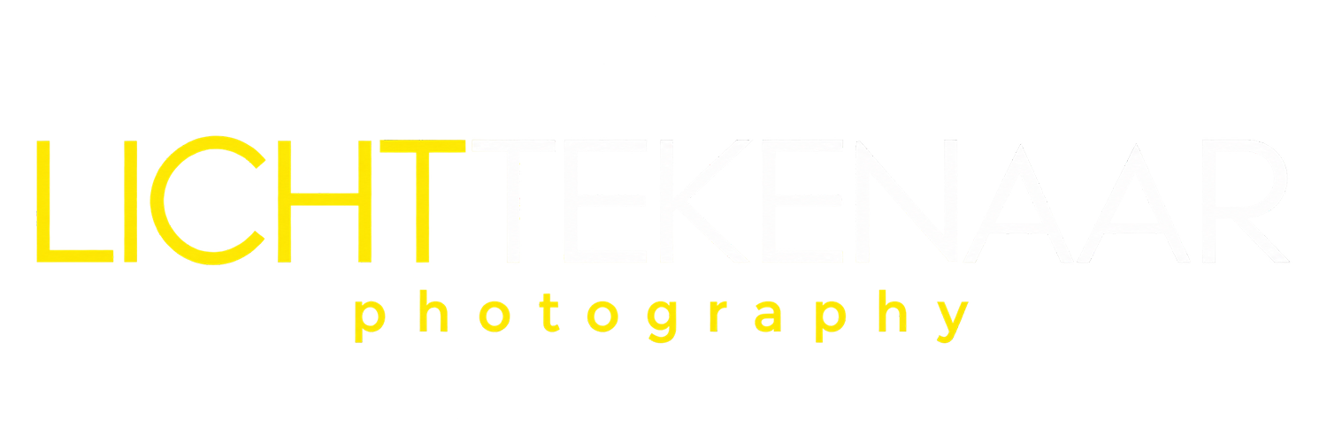 Lichttekenaar-logo in geel en wit op zwart